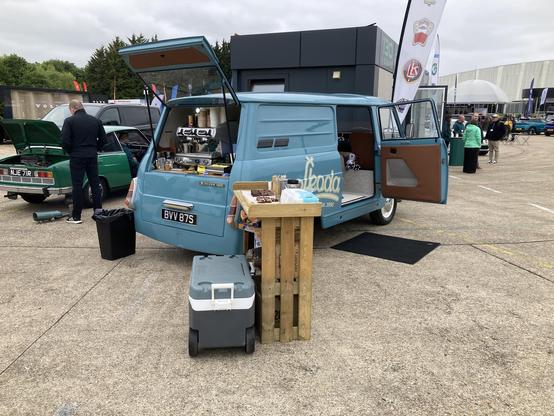 Mid-blue Skoda 1203 van being used as a coffee truck, rear quarter view