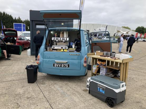 Mid-blue Skoda 1203 van being used as a coffee truck, rear view