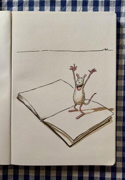 A playful illustration of a whimsical monster standing on an open book, raising its arms in excitement. The background is simple, enhancing the focus on the character and the book. The scene is set on a checkered tablecloth.