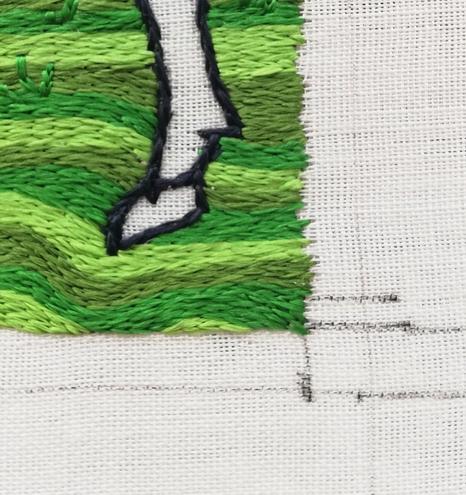 Lower left corner now filled in. You can see the horse's back foot, still unstitched. 
What am I going to call that horse?