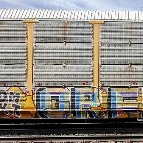 Train car with graffiti rolling through Kamloops BC Canada