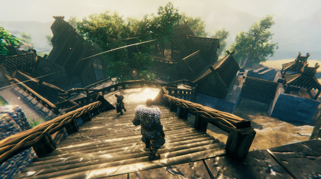 Valheim Screenshot, zwei Männer gehen eine Trppe herunter, die scheinbar in ein Dorf oder eine kleine Stadt führt. Es sind die Dächer meherer Häuser zu sehen.