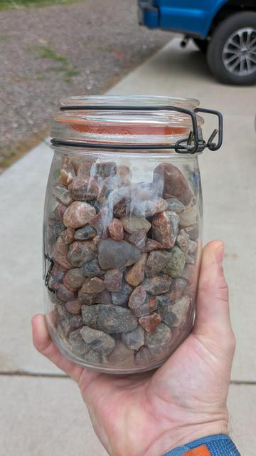 Large jar full of agates