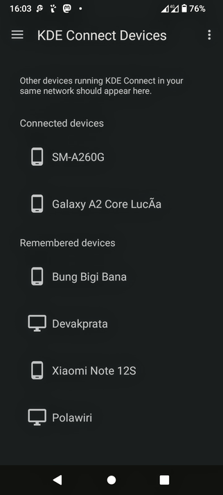 The screencap displays a mobile device screen showing the "KDE Connect Devices" interface. The background is black, and the text is white, providing a high contrast for readability. At the top, the time is shown as 16:03, with a battery level of 76%, and a 4G signal indicator. The main section of the screen lists devices connected to the network, with a heading "Connected devices" followed by two entries: "SM-A260G" and "Galaxy A2 Core Lucãa," each accompanied by a smartphone icon. Below this, there is a section titled "Remembered devices," listing four devices: "Bung Bigi Bana," "Devakprata," "Xiaomi Note 12S," and "Polawiri," each with a corresponding icon. The interface is designed for easy navigation, with a menu icon on the left and a three-dot menu on the right.

 Ovis2-8B

🌱 Energy used: 0.236 Wh