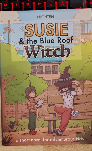 Photo of the cover of Nighten's book "Susie & the Blue Roof Witch"