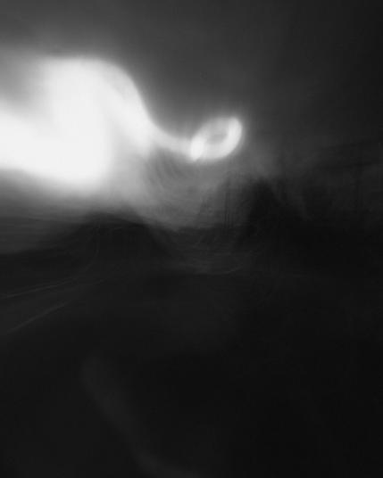 Portrait format black and white photograph of an abstract and surreal landscape shot in camera using long exposure and intentional camera moves (ICM)

photography by al keddie