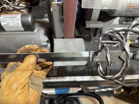 Sharpening both edges of both blades (4 passes) to achieve paper-slicing edges. Not especially easy with a thin 36-inch, flexible blade!