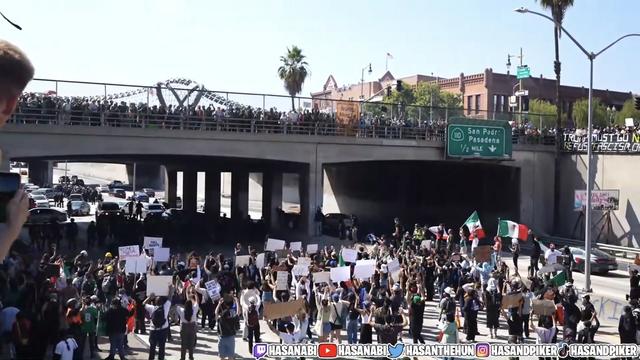 Hundreds of protestors on the bridge and freeway