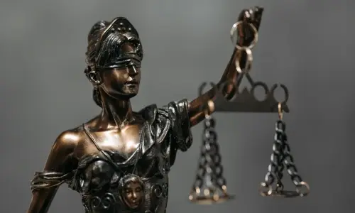Justitia, godless of justice