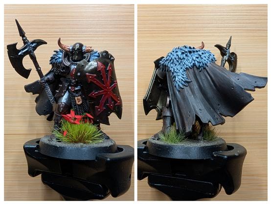 Collaged photo of the front and back of a painted Chaos Warrior from the Age of Sigmar game.