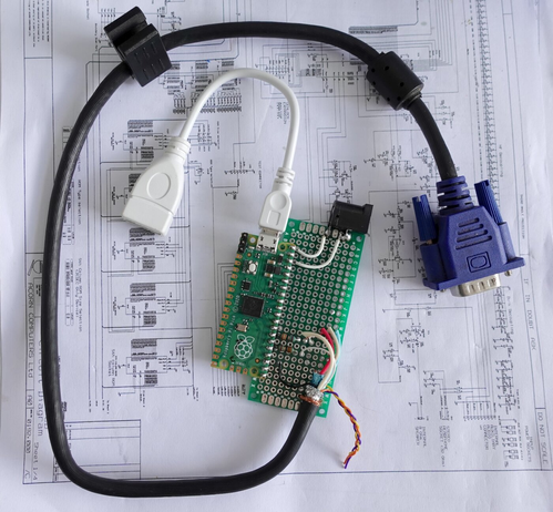 "A Raspberry Pi RP2040 microcontroller (on a Pico board), driving monochrome VGA video and taking USB keyboard/mouse input, emulating a Macintosh 128K computer and disc storage."