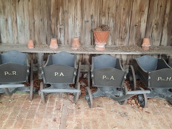 Small wheelbarrows with the children's initials