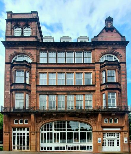 A red sandstone Free Classical style Vicforian conmercial building in Glasgow.