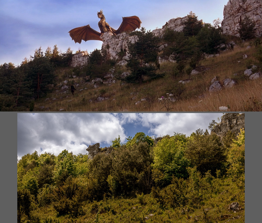 Dragon sitting ontop of a rock formation against the sky, wings casually relaxed openened