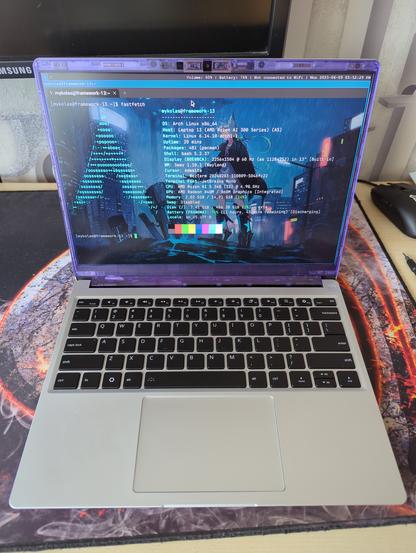 The laptop running Arch Linux with Sway