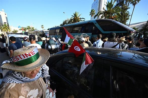 Tunisians gather at a meeting point in Tunis. AFP