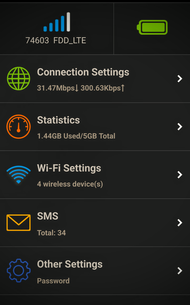 The image displays a mobile device's network settings screen with a dark background. At the top, there is a signal strength icon showing four blue bars and a battery icon indicating full charge. Below, the network name "74603 FDD_LTE" is displayed. The "Connection Settings" section shows a download speed of 31.47 Mbps and an upload speed of 300.63 Kbps. The "Statistics" section indicates 1.44 GB used out of a total of 5 GB. The "Wi-Fi Settings" section shows that there are 4 wireless devices connected. The "SMS" section shows a total of 34 messages. The "Other Settings" section includes a "Password" option. Each section has a right-pointing arrow, suggesting further options.

 Ovis2-8B

🌱 Energy used: 0.198 Wh