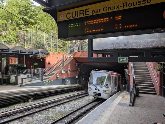 A rack metro train on line C ascending into Croix Pâquet station, the steepest metro station in the world, towards Cuire