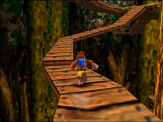 Banjo the bear running along a winding wooden walkway suspended in the air.