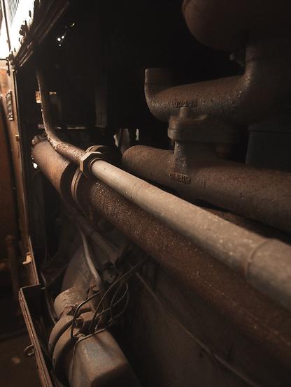 Pipes and internal parts of an old engine