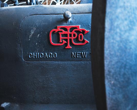The logo of an old tractor