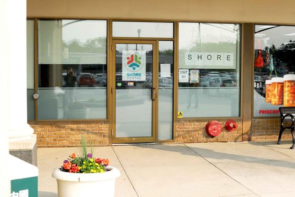 Photo of the front doors of the SHORE Centre clinic at Westmount and Erb.