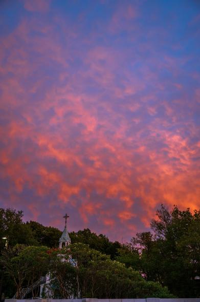 Chapel of Brother Andre under a very dramatic, fiery orange and purple, sunset sky tucked away in the backyard of Saint Joseph Oratory, Mount Royal, Montreal, QC Canada
Captured by Komeil Karimi