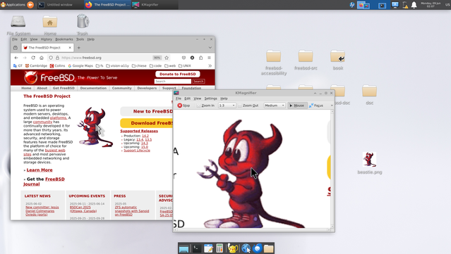 A desktop screenshot shows a web browser open to the FreeBSD project website, displaying information about the operating system and a cartoon red devil mascot. A separate image viewer application is open, showing a zoomed-in view of the red devil mascot