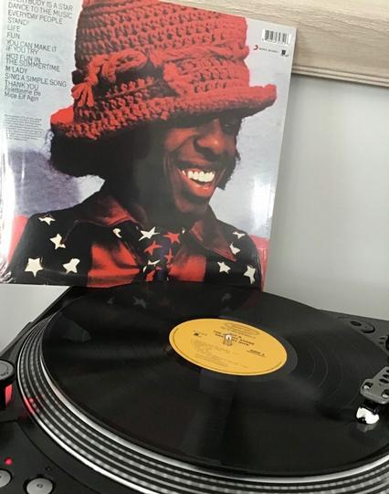 Sly and the Family Stone: Album cover and record on a turntable