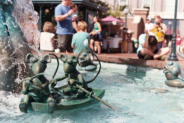 other is fishing for coins in the fountain. Located at the fountain in the now defunct Muppets Courtyard at Disney's Hollywood Studios. Shot on Kodak Gold 200 using a Canon AE-1.