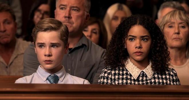 Diesel La Torraca and Antonia Gentry sit in a courtroom in season 3 of Ginny & Georgia