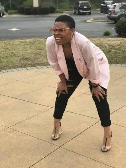 The lady squat and squint meme