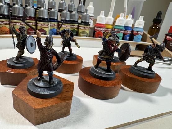 Six 28mm scale Viking warriors in various stages of yelling and brandishing.