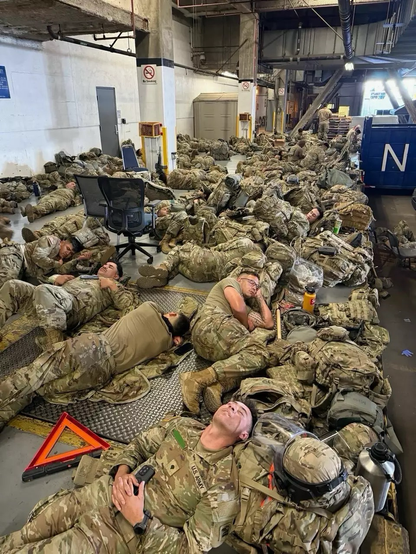 Photos obtained by the Chronicle show California National Guard troops deployed by the Trump administration to Los Angeles packed together in what appear to federal building basements or loading docks. The source who provided the photo said they redacted the name of one soldier that appeared in this photo.