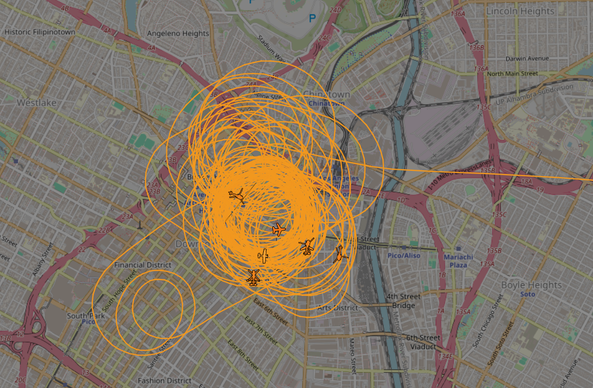 LA map covered in orange circle lines, seems to be flying all over but mainly downtown (I don't know LA well enough to describe exactly)