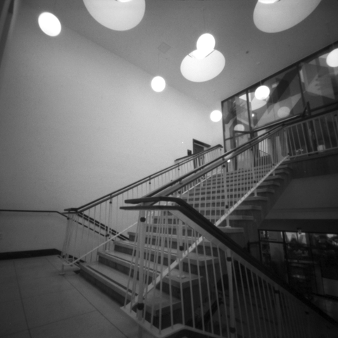 Photograph looking across a 60s modernist style staircase