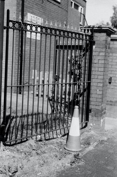 A lonesome Traffic cone, waiting to be given purpose, a reason to exist as it watches the world go by