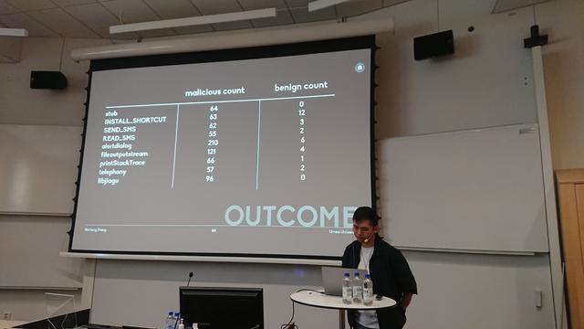 A slide showing a list of tokens and the number of malicious versus benign applications they appear in