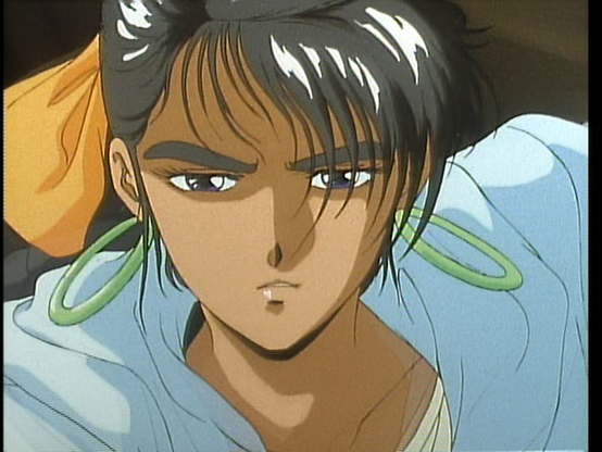 Closeup on Runa's face. She has the giant, green, 80's-style hoop earrings. You can see a bit of her orange hair bow peaking from behind her head.
