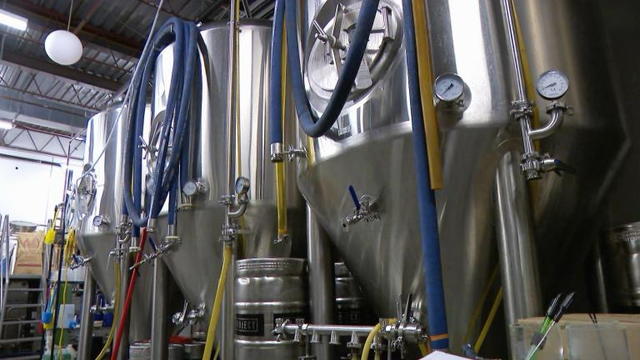 A row of brew kettles
