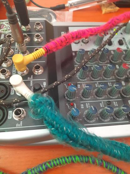 a mixer with multiple cables that are knit-wrapped