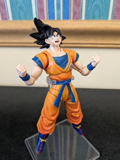 S. H. Figuarts Goku on a flight stand in a floating ki charging position