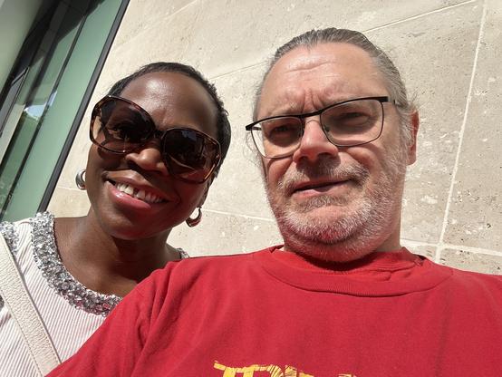 An average looking man with his beautiful wife - he’s clearly out of his league with her. But she loves him and he loves her and they have been together for just over 25 years so they must be doing something right.
