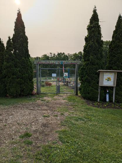 The entrance to our community garden, located on a hill overlooking our town. This community garden has been going for quite awhile, at least over a decade.