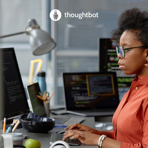 photo of a developer and thoughtbot logo