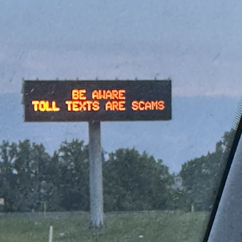 Highway signage on toll and DMV scams