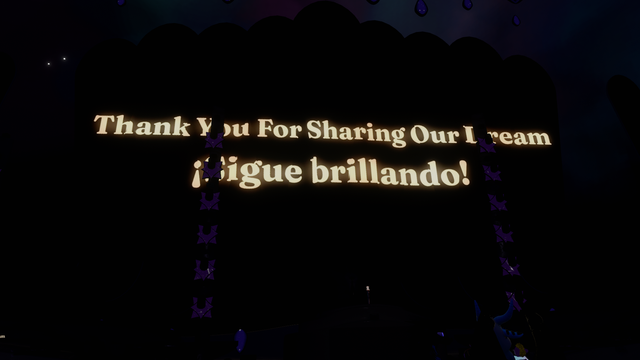 VR Screenshot. A dark club stage with the words "Thank you for sharing our dream. Sigue brillando!"