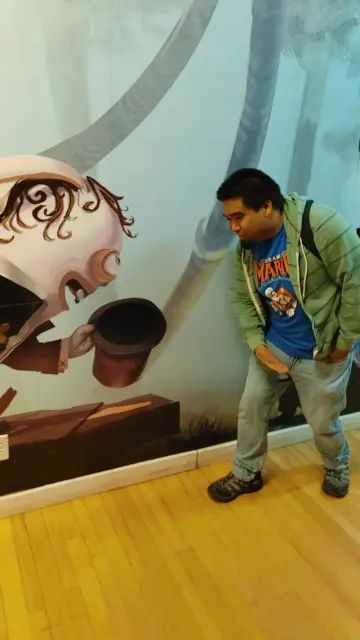 A picture. It's of me bowing towards a picture of a Rabbid. The Rabbid is dressed in a suit and is also bowing. It looks like we are bowing towards each other.