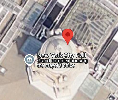 It points to new york city hall