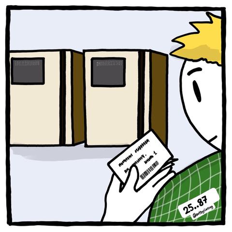 Pictured standing in front of two clocking in machines, with a damaged clock in card.
